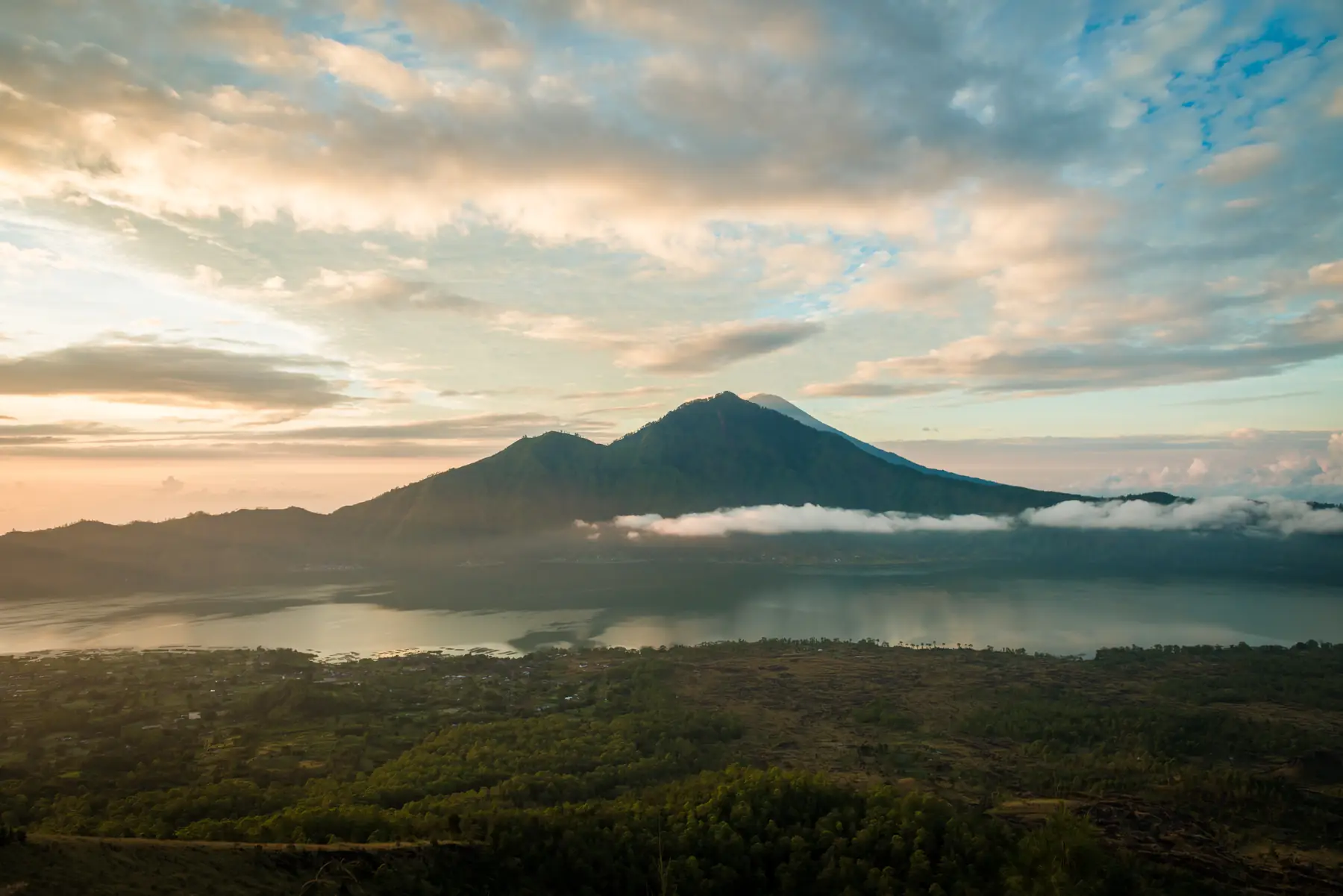 Early light over Mount Batur and the mist above Lake Batur, Bali